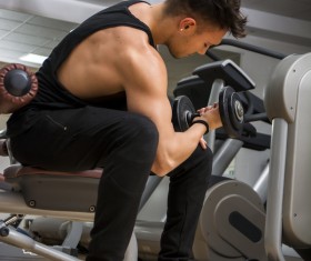 Young people working out at the gym Stock Photo 02