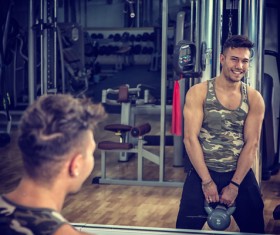 Young people working out at the gym Stock Photo 04