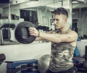 Young people working out at the gym Stock Photo 05