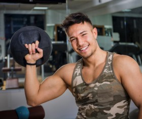 Young people working out at the gym Stock Photo 06