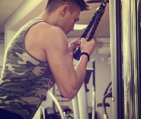 Young people working out at the gym Stock Photo 07