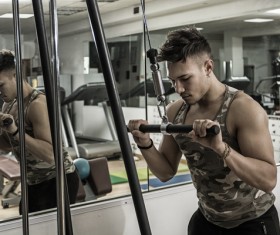 Young people working out at the gym Stock Photo 09