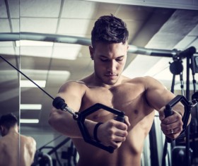 Young people working out at the gym Stock Photo 11
