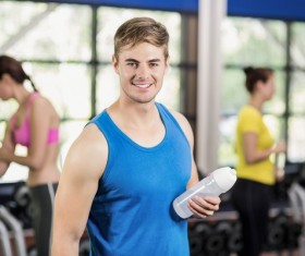 Young people working out in the gym Stock Photo 01