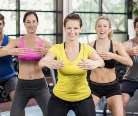 Young people working out in the gym Stock Photo 03