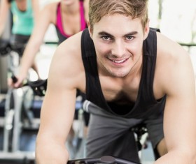 Young people working out in the gym Stock Photo 06