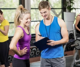 Young people working out in the gym Stock Photo 09