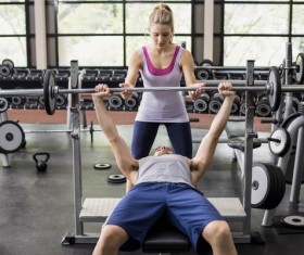 Young people working out in the gym Stock Photo 10