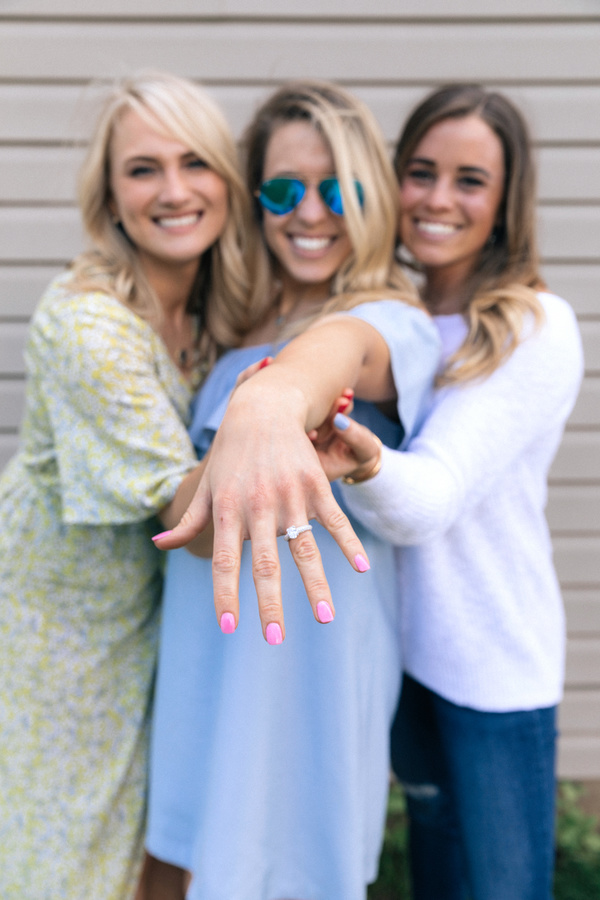 female friends posing with ring Stock Photo