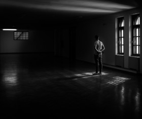 man in empty room Stock Photo