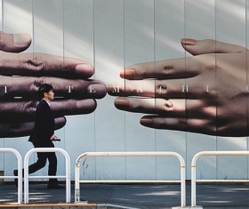 passes by billboard man Stock Photo