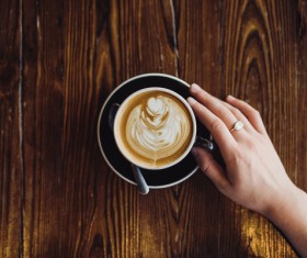 woman hand and coffee cup Stock Photo