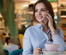 woman on the coffee house call up Stock Photo