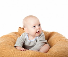 Baby sitting in inflatable chair Stock Photo