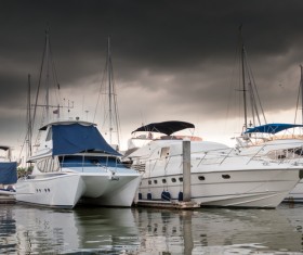 Bad weather yacht moored at the dock Stock Photo
