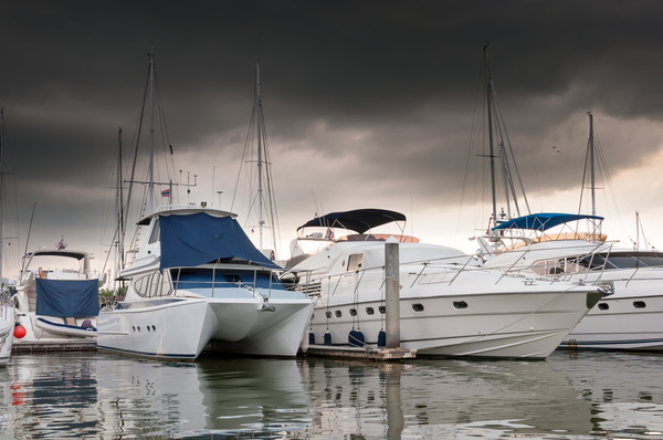 Bad weather yacht moored at the dock Stock Photo