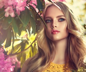 Beautiful girl and blooming flowers Stock Photo 01