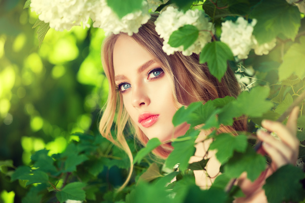 Beautiful girl and blooming flowers Stock Photo 02