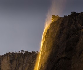 Beautiful waterfall scenery under sunlight Stock Photo
