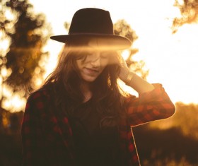 Beautiful young girl posing under sunlight Stock Photo