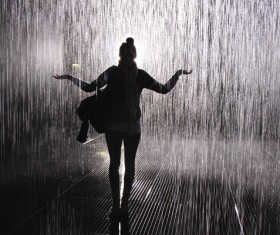 Black and white photo of girl in the rain Stock Photo