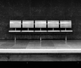 Black white picture of empty seats bench Stock Photo