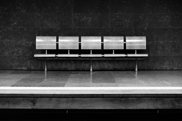 Black white picture of empty seats bench Stock Photo