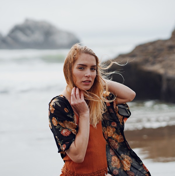 Blonde woman on the beach Stock Photo