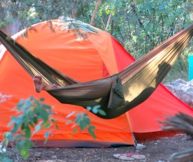 Camping tents and hammocks Stock Photo