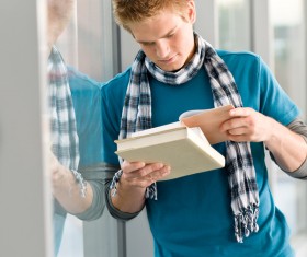 College student reading book Stock Photo