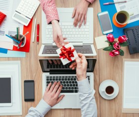 Company staff send each other gifts Stock Photo