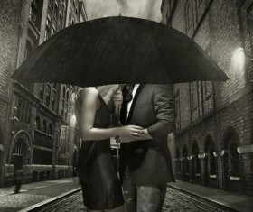 Couple holding an umbrella Stock Photo
