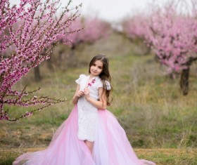 Cute girl holding a flower Stock Photo 01