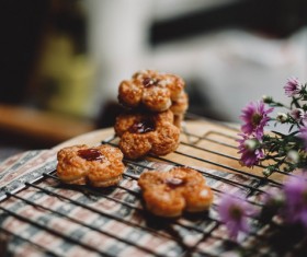 Delicious food and violet flowers Stock Photo