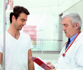 Doctor talking to patient Stock Photo