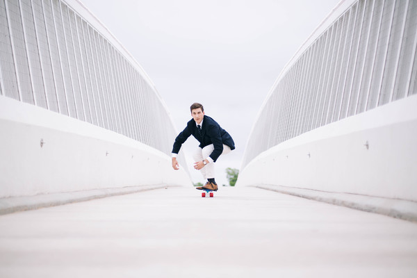 Elegant mens play skateboard Stock Photo