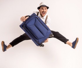 Excited man jumping up Stock Photo