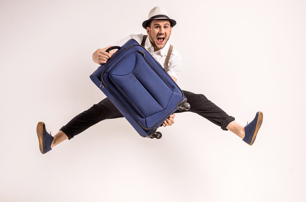 Excited man jumping up Stock Photo