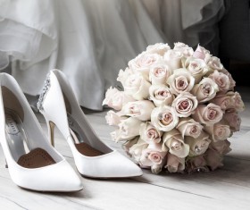 Female high heels and bouquet Stock Photo