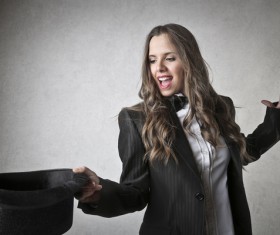 Female magician juggling Stock Photo