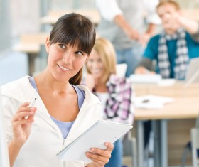 Female students in college classroom Stock Photo