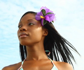 Flower in the womens hair Stock Photo 01