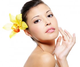 Flower in the womens hair Stock Photo 02