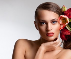 Flower in the womens hair Stock Photo 03