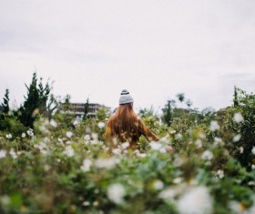 Girl and flowers and plants Stock Photo