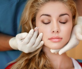 Girl facial botox injection Stock Photo
