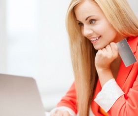 Girl using laptop for online payment Stock Photo 02