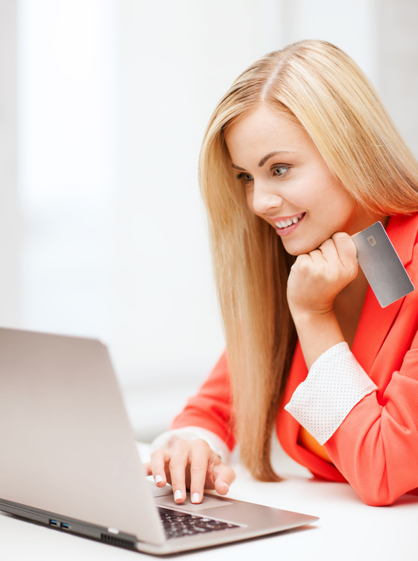 Girl using laptop for online payment Stock Photo 02