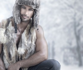 Handsome male wearing furs Stock Photo