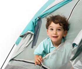Little boy in tent Stock Photo